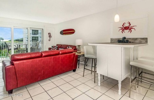 Avon By The Sea Condo | Ola Grande 214-Ocean Front-Pool-Cocoa Beach Pier