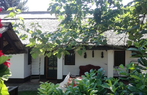 Tiszafured Other | Old, reed-covered farmhouses next to Lake Tisza, near the Puszta