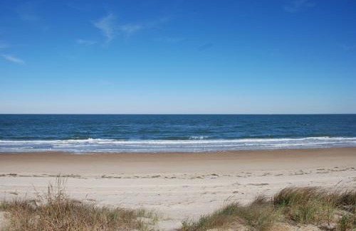 Cottage Line House | Old Time Beach Front Cottage - The Beach is your Backyard! Pet Friendly cottage