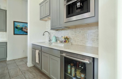 Chandler House | Olive Treeside, a luxury oasis with a pool, pizza oven, grill, fireplace