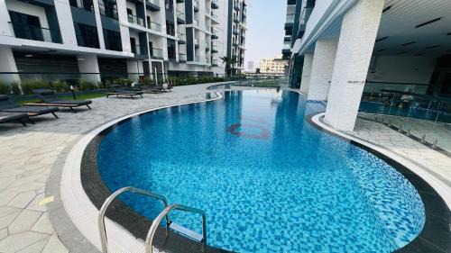 International City Apartment | Olivz Residence Furnished Cozy Studio Apartment