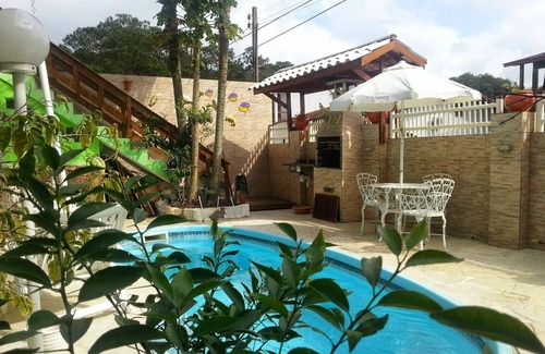 Barra da Lagoa Apartment | One-bedroom apartments with air conditioning, pool and barbecue on the patio
