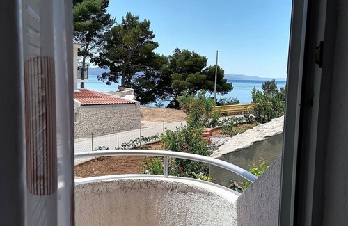 Igrane Apartment | One bedroom apartment with balcony and sea view Igrane, Makarska (A-24696-b)
