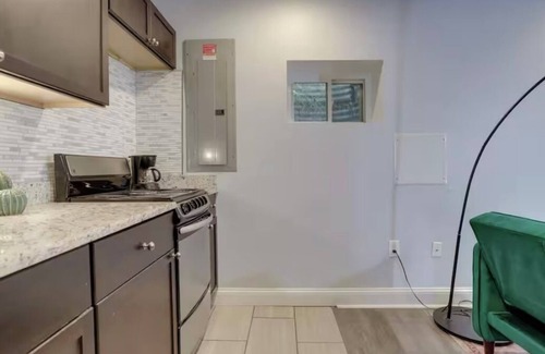 Deanwood Apartment | One bedroom garden level home with free parking and full kitchen