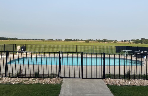 Pryor House | Only 1.7 miles from ROCKLAHOMA! Large home with pool, accommodates 10+ guests!