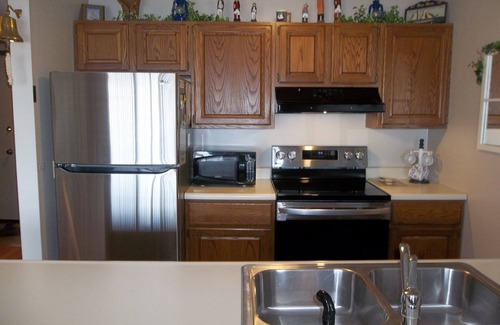 Lake Ozark Condo | Only 2 Steps In! Great Condo Overlooking Lake & Pool! King Bed!