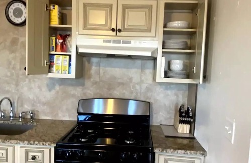 Gloucester Apartment | Open concept, 2-level apartment with scenic view