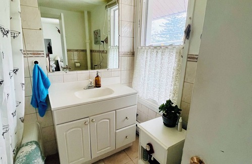Peterborough Apartment | Open Concept meets Cottage~core in this charming home above a corner store