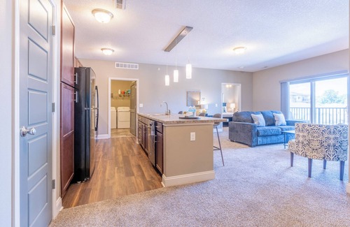 West Des Moines Apartment | Open Living Room Garage Balcony Pool