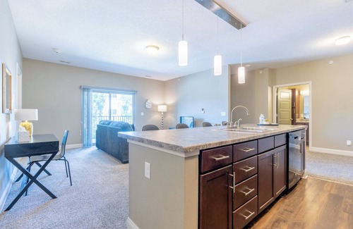 West Des Moines Apartment | Open Living Room Garage Balcony Pool