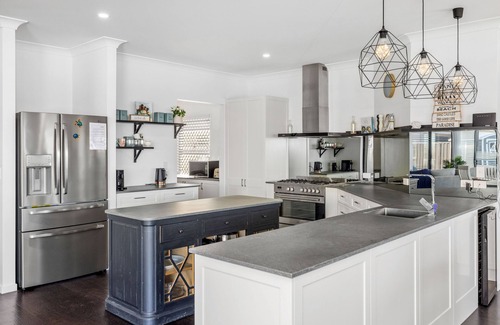Banksia Beach House | Opulent Canal-Front Retreat