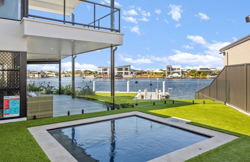 Banksia Beach House | Opulent Canal-Front Retreat