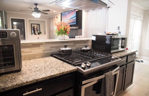 Sandtown House | Orange Oasis Villa Indoor Fireplace Garage Firepit BBQ grill near EVERYTHING!
