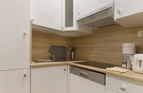 Terezvaros Apartment | ORANGE STUDIO OKTOGON ANDRASSY Mezzanine Room DUPLEXSTYLE