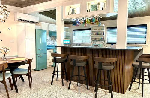 Titusville House | Orlando Vacation Rental Heated Pool & Spa 5 BR 3 BA Near Space, Nature, Disney