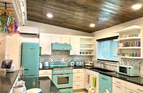 Titusville House | Orlando Vacation Rental Heated Pool & Spa 5 BR 3 BA Near Space, Nature, Disney
