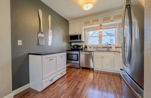 Cedar Falls House | Outdoor Oasis With HOT TUB, Brick Patios, Large Deck & Fenced In - 3Bed/2Bath!