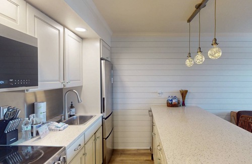 Sunset Beach Condo | Outstanding One Bedroom Condo, on the Bay, Heated Pool, Directly Across from the Beach!