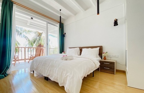 Thulusdhoo Island House | Overlooking ocean that meets cloudless sky, Coral Inn is a sanctuary of serenity