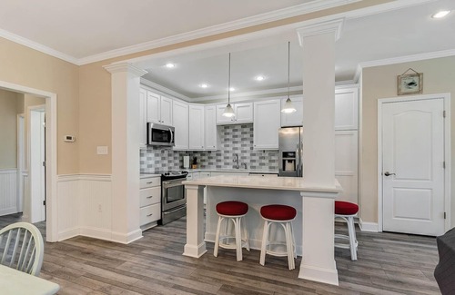 Cape Charles House | Overlooking Park with 1st and 2nd Floor Primary Suites.