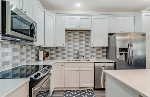 Cape Charles House | Overlooking Park with 1st and 2nd Floor Primary Suites.