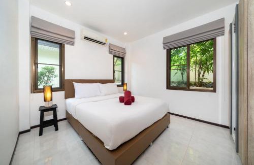 Rawai Villa | Oxavia Garden Oasis in Nai Harn - Your Private Tropical Garden with 3 Cabins and Jacuzzi