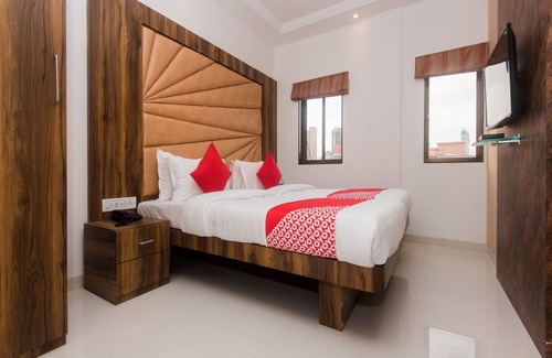 Girgaon Hotel | OYO 15519 Hotel Grand Residency