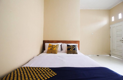 Mandau Hotel | OYO 2592 Homestay Bunda Puja