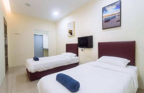 Taman Cendana Hotel | OYO 90090 Roselyn Inn 2