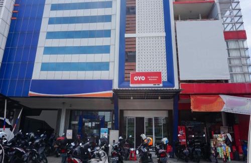 South Tangerang Hotel | OYO 90305 De Umbrela Mansion Syari'ah Ciputat