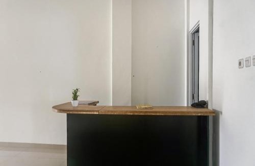 South Tangerang Hotel | OYO 90305 De Umbrela Mansion Syari'ah Ciputat