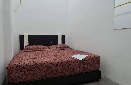 Kampung Berjaya Hotel | OYO 90866 Rakyat Inn