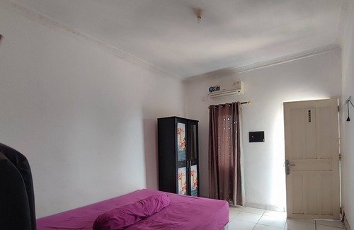 Palembang Hotel | OYO 93252 Garuda Bandara Guesthouse