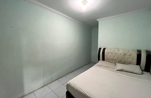 Medan Hotel | OYO 93417 Homestay Bunga Rinte Syariah Near Komp perumahan stella ressidence 2