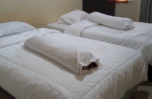 Pekanbaru Hotel | OYO 93866 Neva Guest House SyariahNearWaduk Cipta Karya