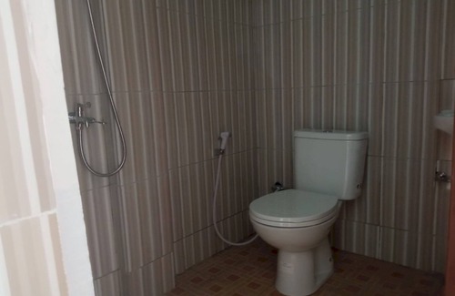 Pekanbaru Hotel | OYO 94101 Ratha Guest House Syariah
