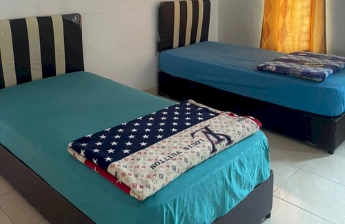 Pekanbaru Hotel | OYO 94101 Ratha Guest House Syariah