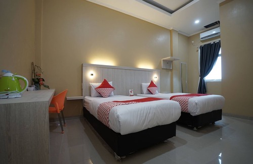 Sukarami Hotel | OYO Life 1299 Balcony Orange Homestay