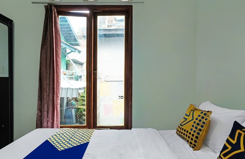 Muncar Hotel | OYO Life 92258 Kostel 21 Syariah