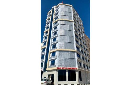 Al Maabilah Hotel | OYO Townhouse 156 Rose Hotel Apartments