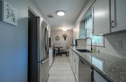 South Central Omaha House | Pacific Place - Central, Private Stay with Fireplace, Garage & Deck