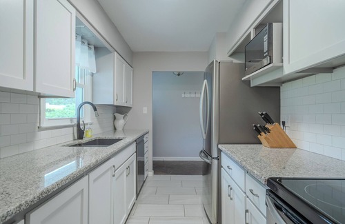South Central Omaha House | Pacific Place - Central, Private Stay with Fireplace, Garage & Deck