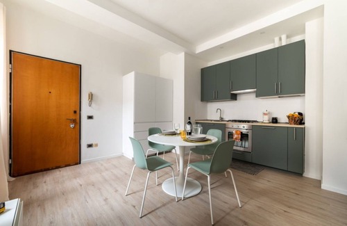 Parma City Centre Apartment | Palazzo Tarasconi Petrol Color Apartment