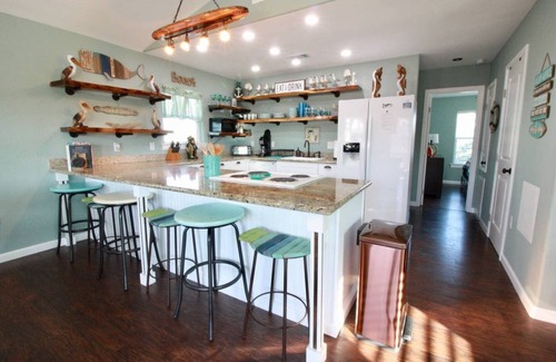 Jamaica Beach House | Palm Breeze Canal Home with Kayaks & Bicycles - Sleeps 6 STR25-000199
