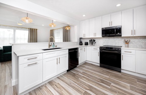 Palm Harbor House | Palm Harbor Fun Hub: Pool, Game Room, Movie Nights
