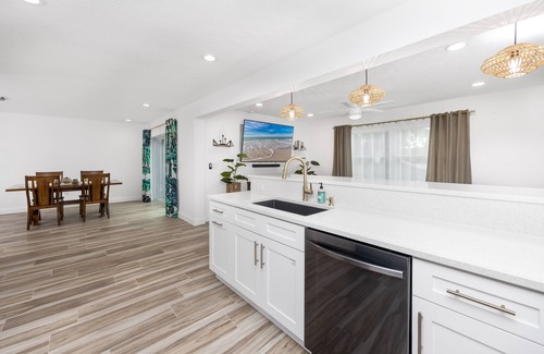 Palm Harbor House | Palm Harbor Fun Hub: Pool, Game Room, Movie Nights