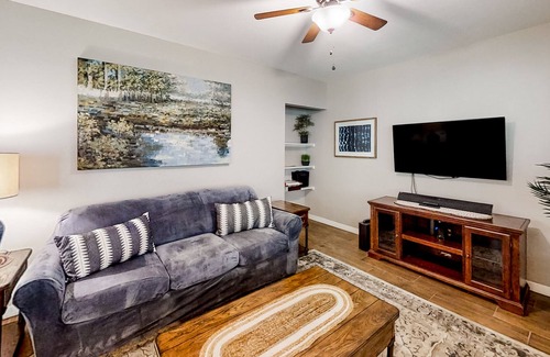 Weeki Wachee Gardens House | Palm-lined home with water access, game room, balcony, W/D, and central AC