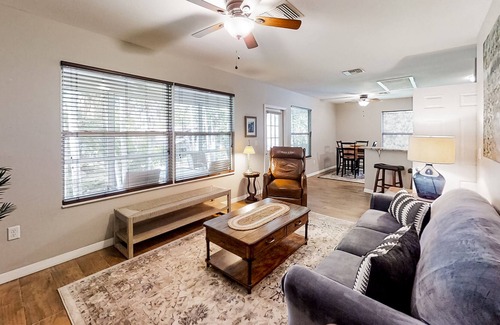 Weeki Wachee Gardens House | Palm-lined home with water access, game room, balcony, W/D, and central AC