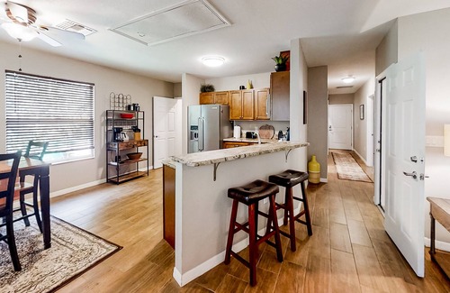 Weeki Wachee Gardens House | Palm-lined home with water access, game room, balcony, W/D, and central AC