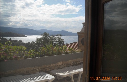 Mithimna Apartment | Palm Tree Apartment Central Molivos apartment with panoramic views